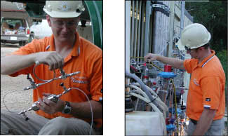 David Riestenberg, an ORISE post-MS researcher collects subsamples from the high pressure manifold system of the monitoring well using high pressure cylinders and tubing.